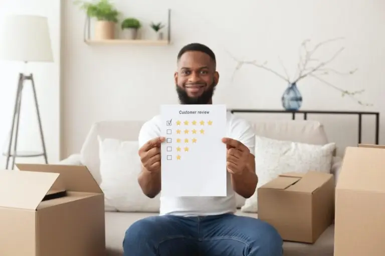 African american man puts five stars at customer review